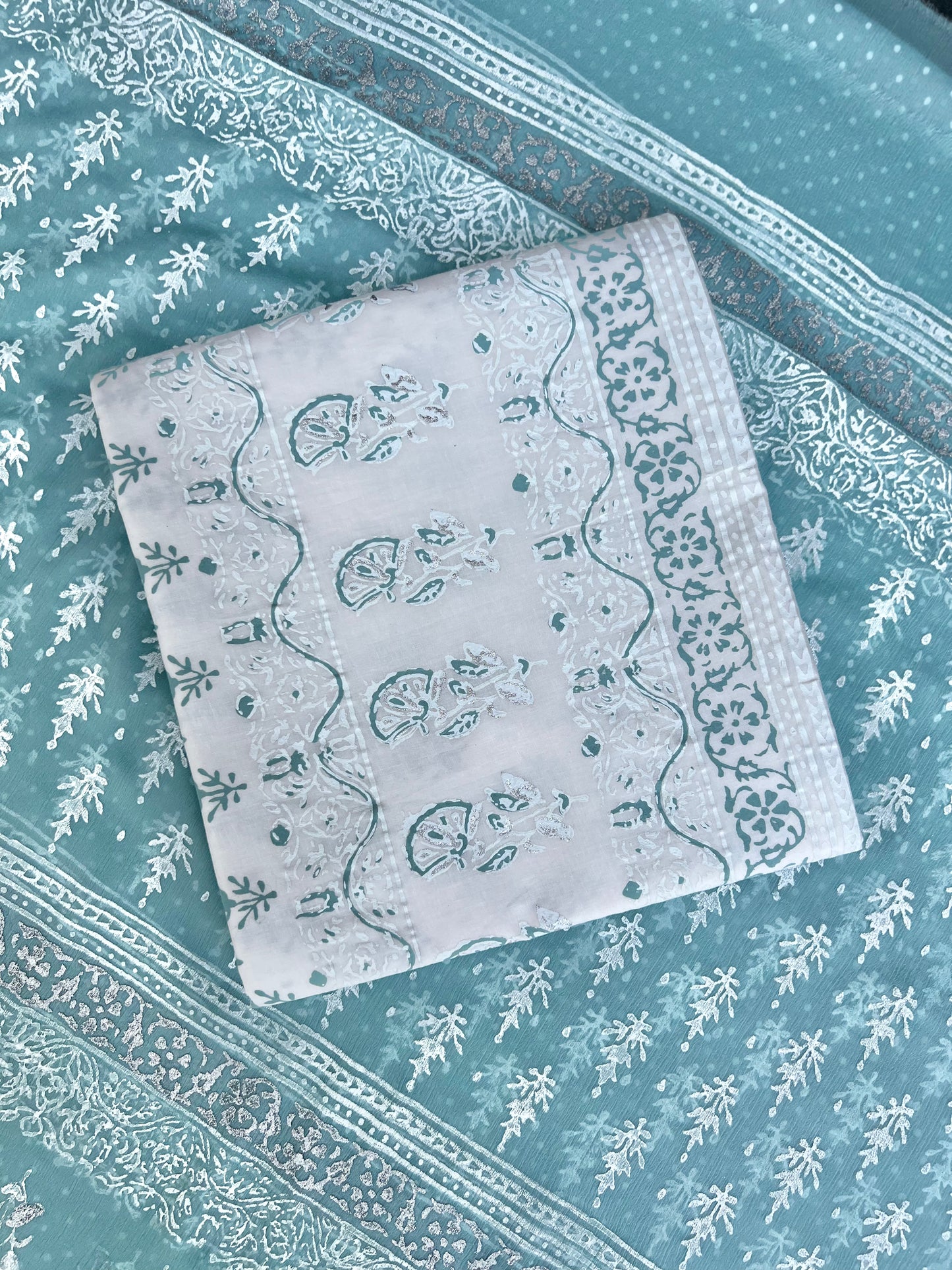 white and turquoise
